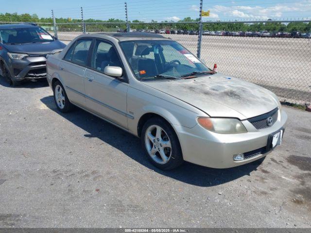  Salvage Mazda Protege